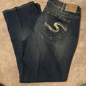 Woman’s silver jeans